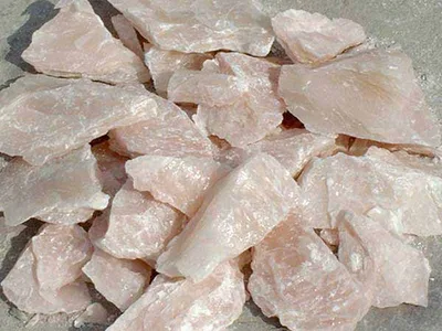 Fine white industrial mineral for specialty formulations